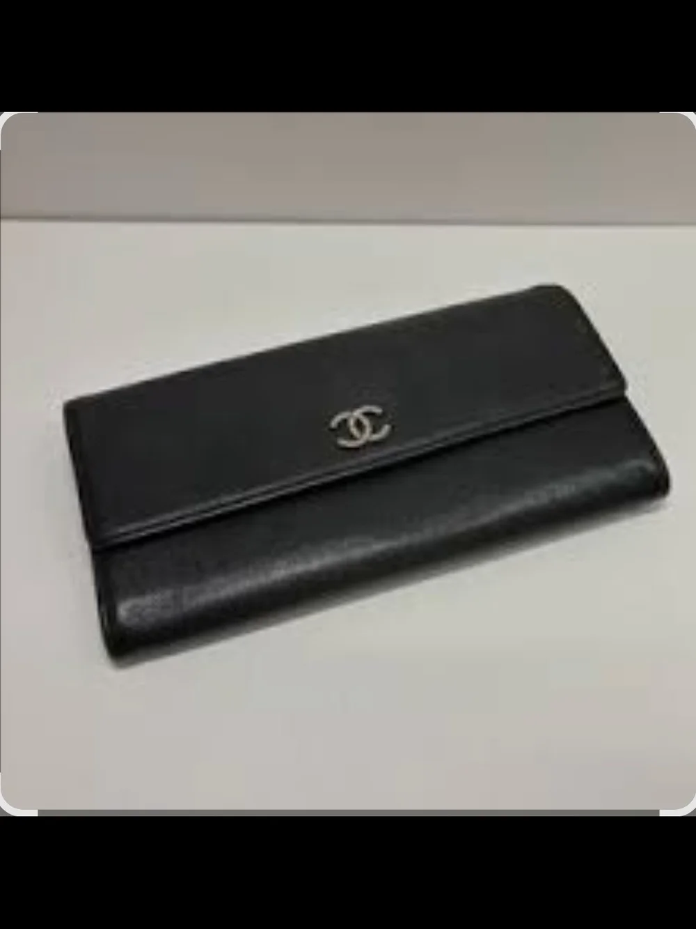 CHANEL Black Leather Flap Wallet with Silver CC Emblem